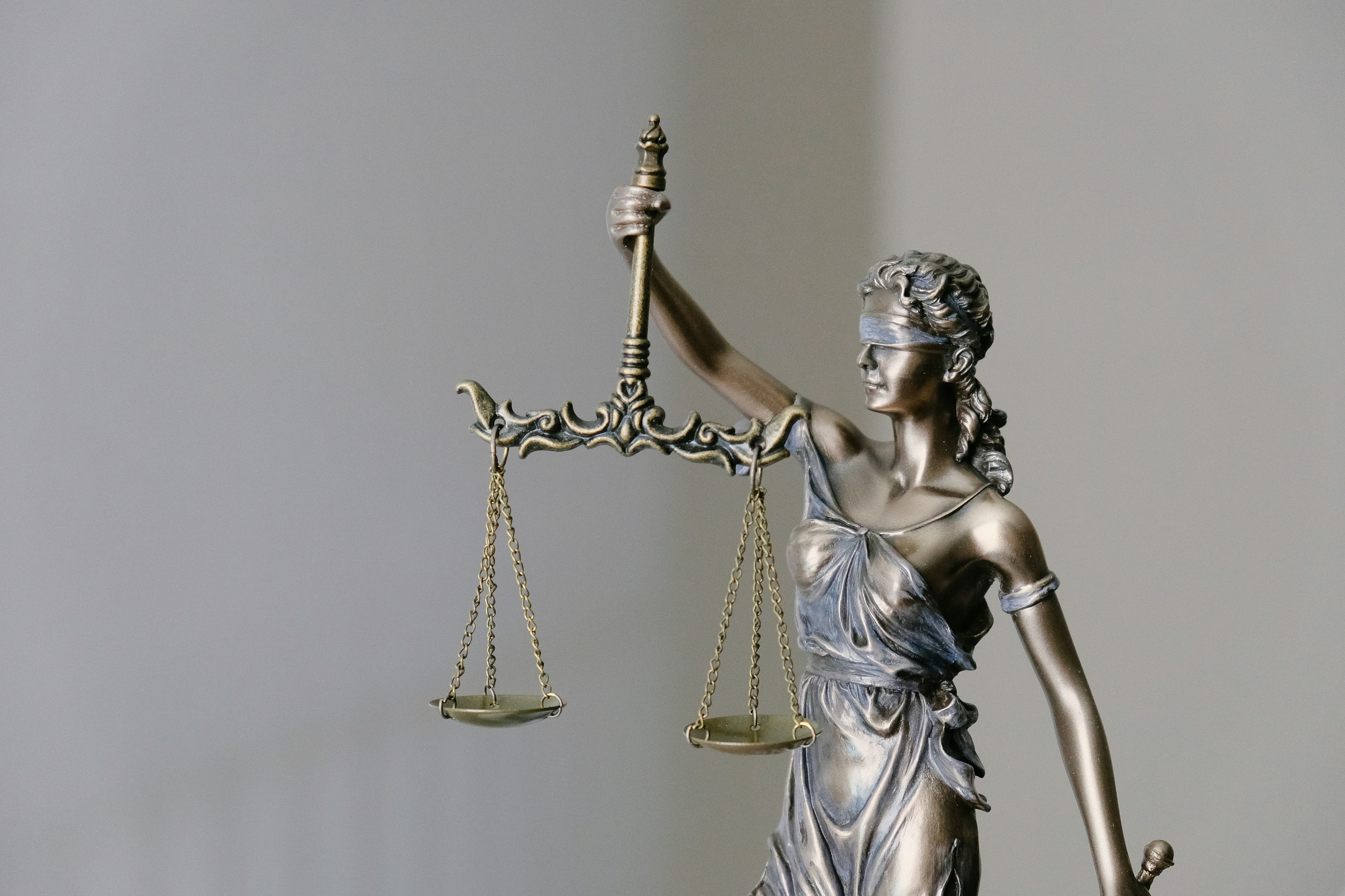 Gavel and scales of justice in courtroom